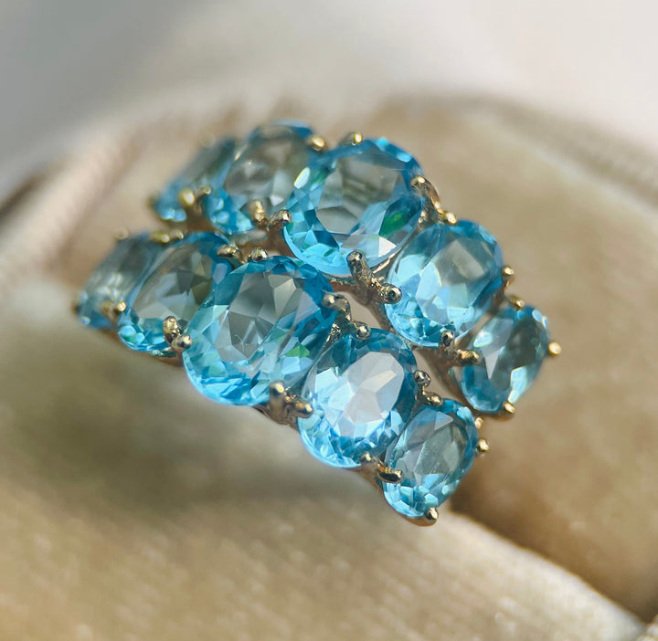 Modern Blue Topaz Graduated Ring in 10k Yellow Gold