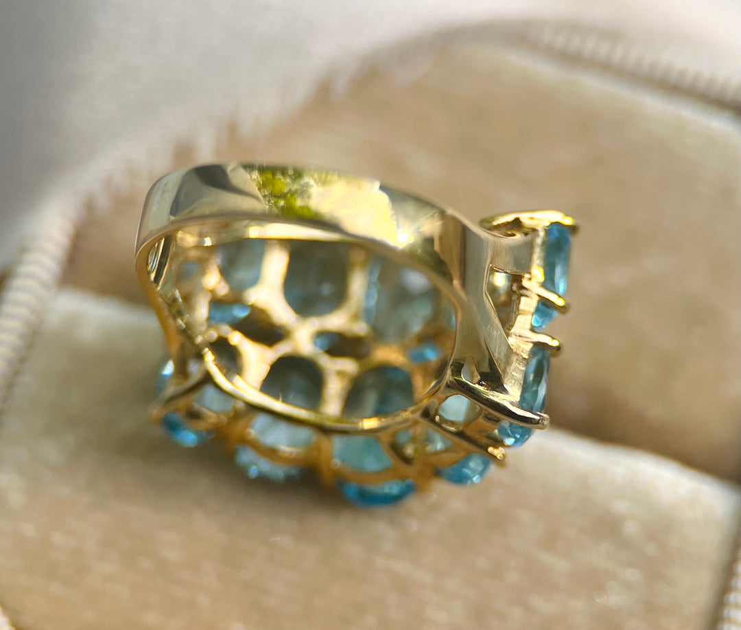 Modern Blue Topaz Graduated Ring in 10k Yellow Gold