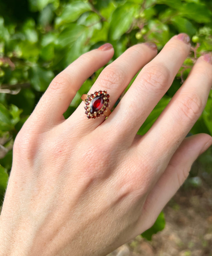 Autumn Glow Garnet Marquise Halo Ring in Solid Yellow Gold