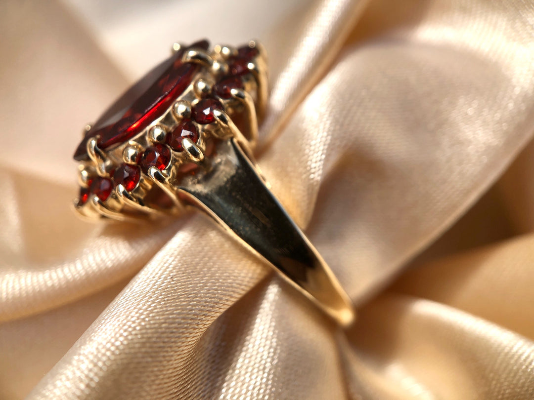 Autumn Glow Garnet Marquise Halo Ring in Solid Yellow Gold