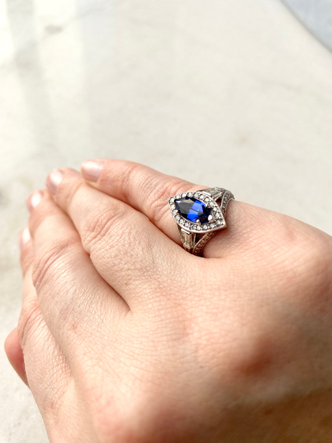 Stunning Sapphire Ring Surrounded by Diamonds