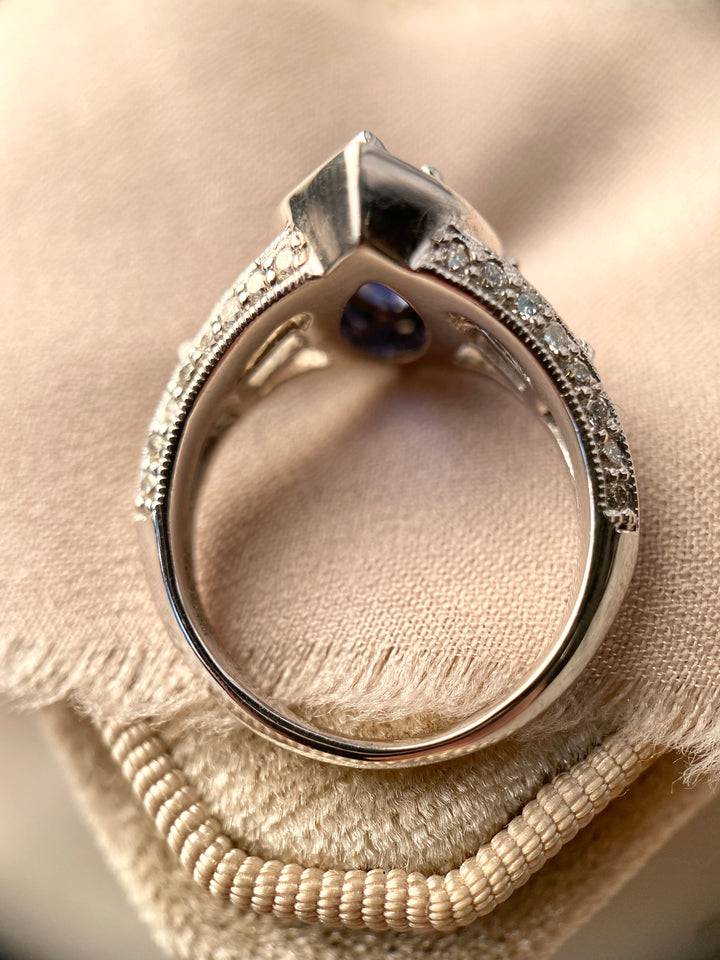 Stunning Sapphire Ring Surrounded by Diamonds