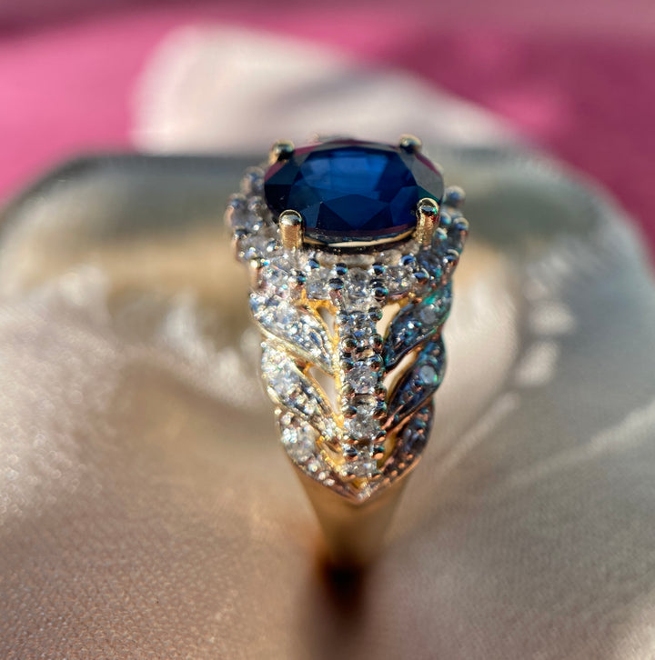 Vintage Sapphire And Diamond Leaf Halo Ring in 14k Warm Yellow Gold