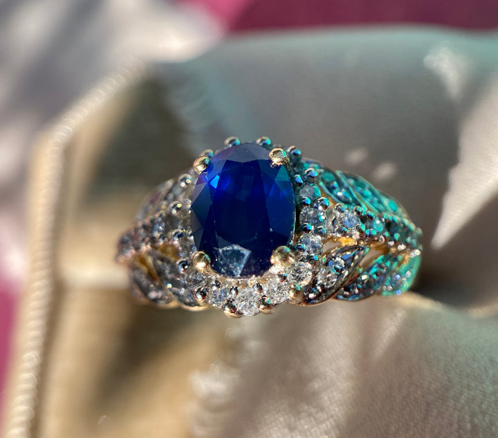 Vintage Sapphire And Diamond Leaf Halo Ring in 14k Warm Yellow Gold