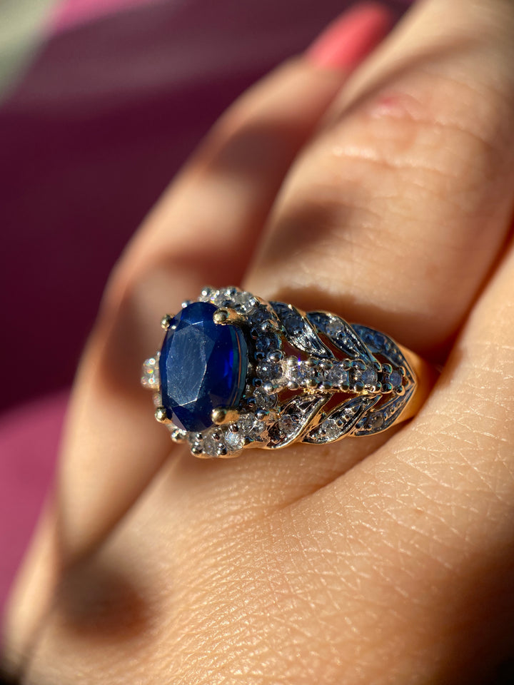 Vintage Sapphire And Diamond Leaf Halo Ring in 14k Warm Yellow Gold