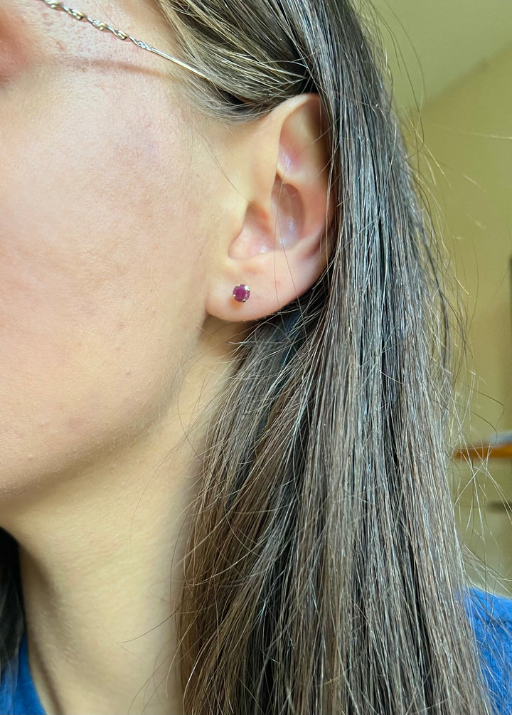 Ruby studs in 10k Yellow Gold