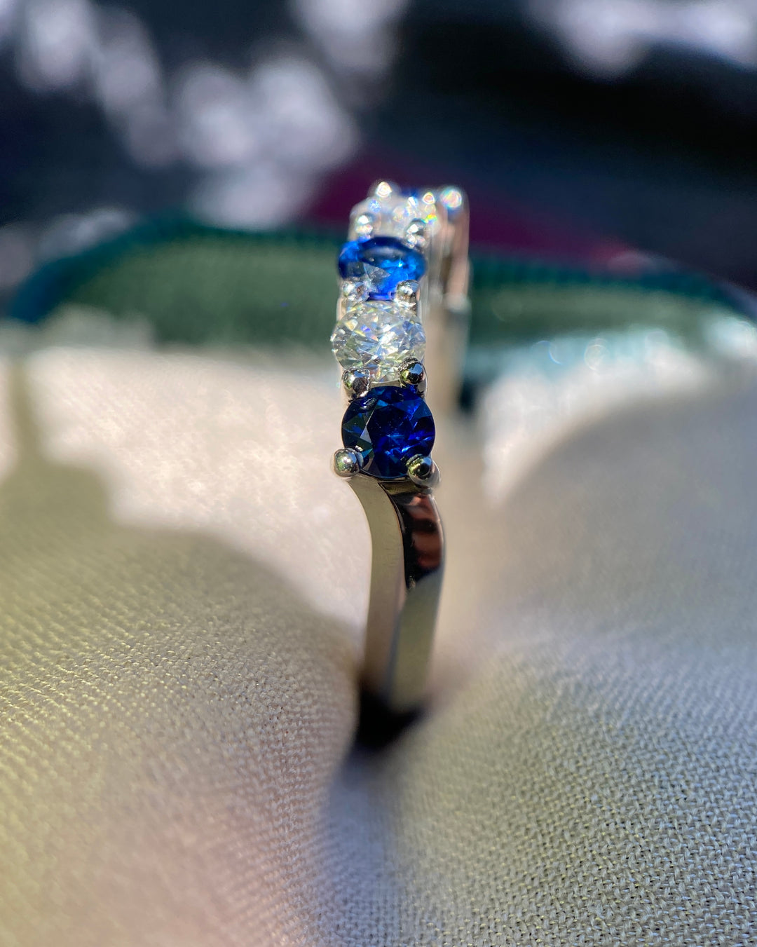 Shining Star Sapphire And Diamond Curved Band Set In Platinum