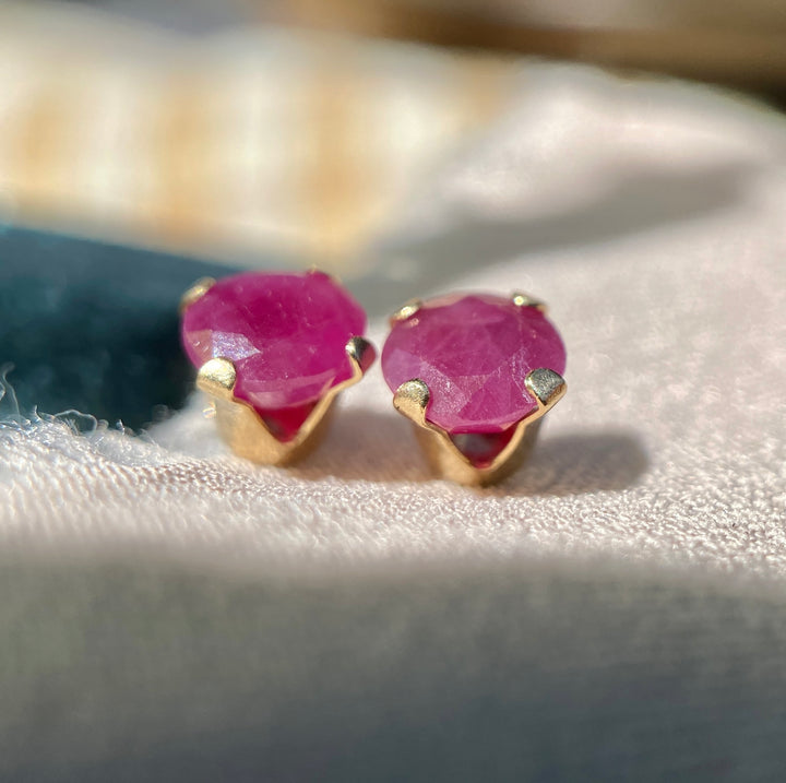 Ruby studs in 10k Yellow Gold