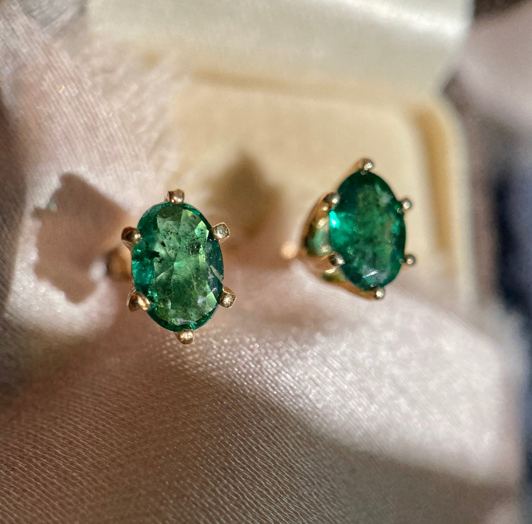 Oval Emerald Studs With TCW .66 in 10k Yellow Gold