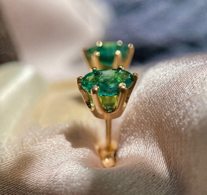 Oval Emerald Studs With TCW .66 in 10k Yellow Gold