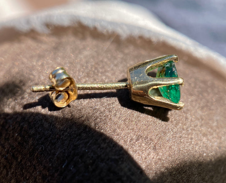 Oval Emerald Studs With TCW .66 in 10k Yellow Gold