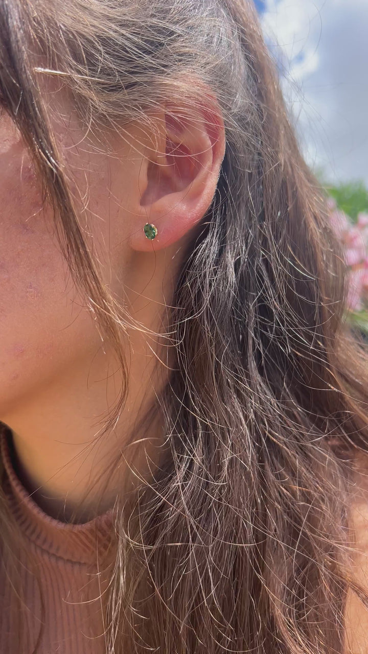 Oval Emerald Studs With TCW .66 in 10k Yellow Gold