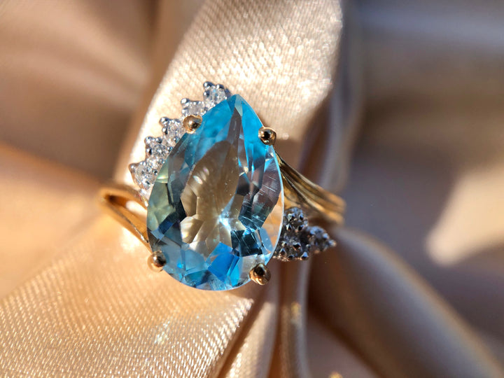 Oceana Blue Topaz Ring with Diamond Accents in 14k Yellow Gold