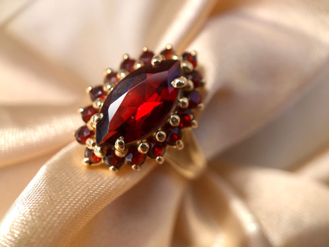 Autumn Glow Garnet Marquise Halo Ring in Solid Yellow Gold