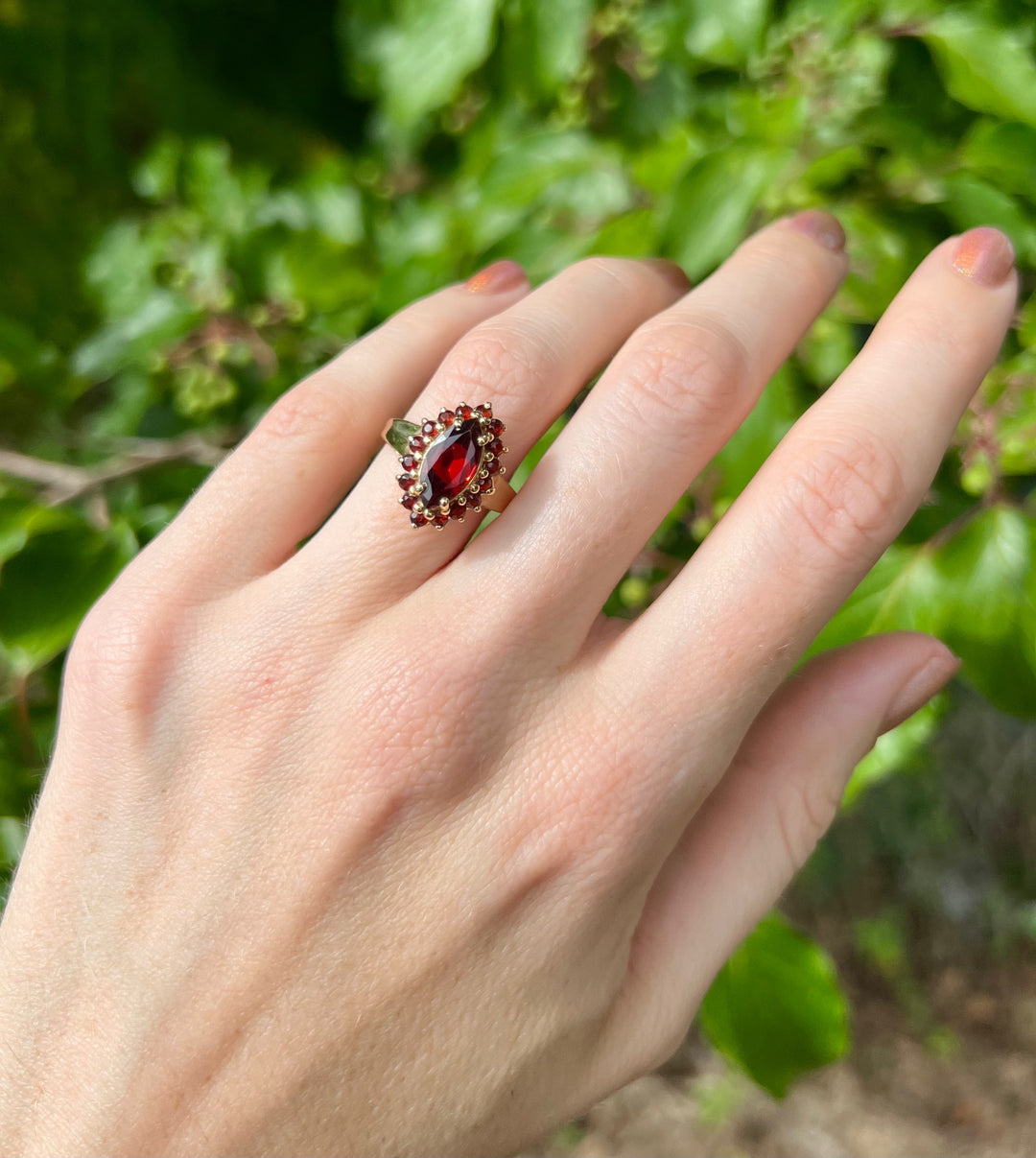 Autumn Glow Garnet Marquise Halo Ring in Solid Yellow Gold